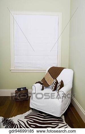 Armchair in a living room View Large Photo Image Stock Photography - Armchair in a living room. Fotosearch