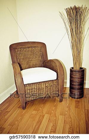 Armchair with a decorative urn View Large Photo Image Stock Photo - Armchair with a decorative urn. Fotosearch