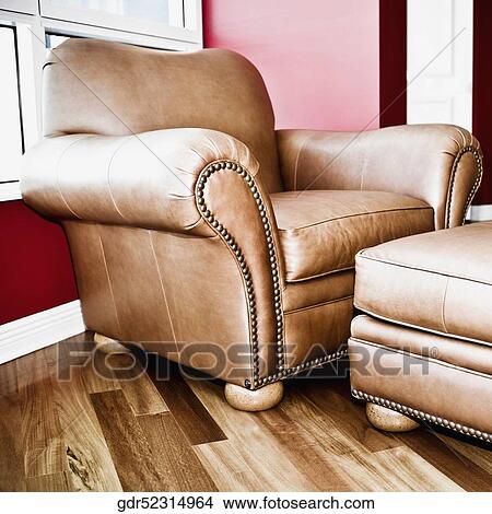 Armchair with a footstool View Large Photo Image Picture - Armchair with a footstool. Fotosearch