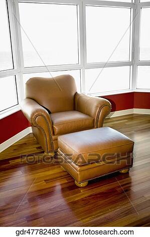 Armchair with a footstool View Large Photo Image Stock Image - Armchair with a footstool. Fotosearch