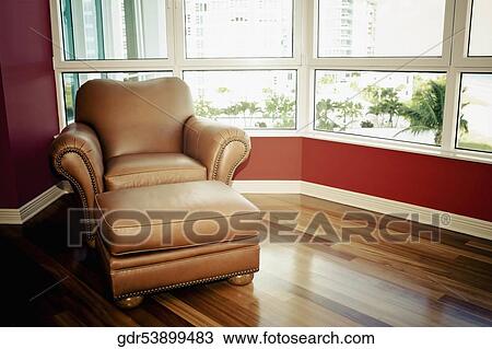 Armchair with a footstool View Large Photo Image Stock Image - Armchair with a footstool. Fotosearch