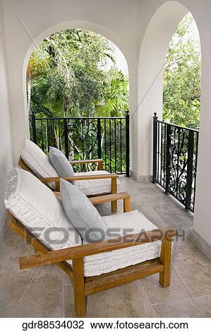 Stock Image - Armchairs in the balcony. Fotosearch
