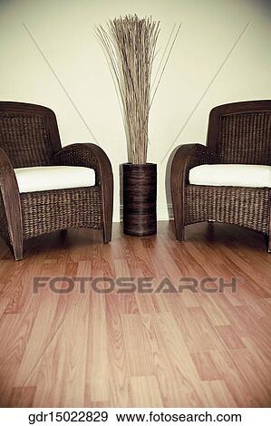 Armchairs with a decorative urn View Large Photo Image Stock Photo - Armchairs with a decorative urn. Fotosearch