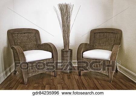 Armchairs with a decorative urn View Large Photo Image Stock Photograph - Armchairs with a decorative urn. Fotosearch