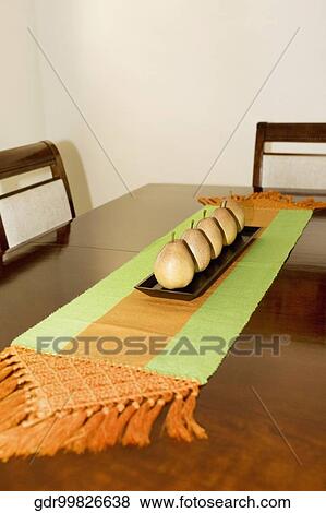 Artificial pears on a dining table View Large Photo Image Stock Photo - Artificial pears on a dining table. Fotosearch