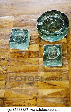 Ashtrays on a table View Large Photo Image Stock Photo - Ashtrays on a table. Fotosearch