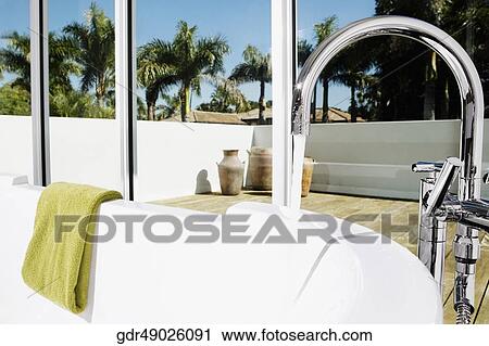 Stock Image - Bathtub in the bathroom. Fotosearch