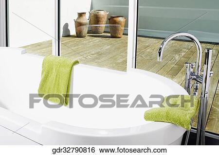 Bathtub in the bathroom View Large Photo Image Stock Photograph - Bathtub in the bathroom. Fotosearch