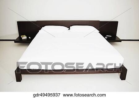 Bed in the bedroom View Large Photo Image Stock Photo - Bed in the bedroom. Fotosearch