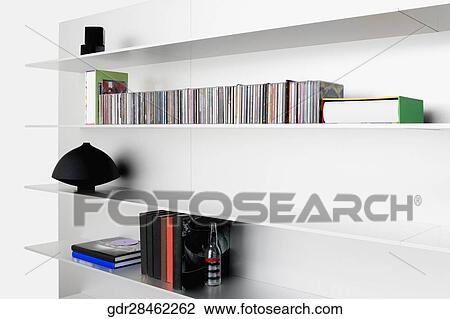 Books and showpiece on shelves View Large Photo Image Stock Image - Books and showpiece on shelves. Fotosearch