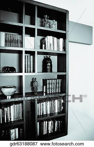 Books in a bookshelf View Large Photo Image Stock Photo - Books in a bookshelf. Fotosearch