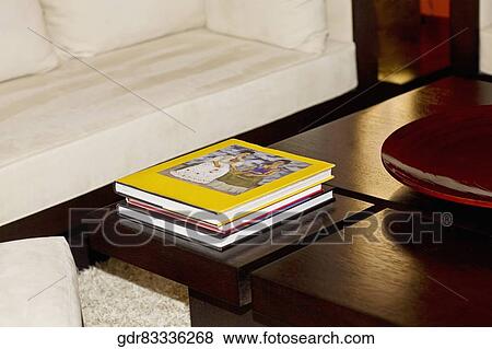 Books on a table View Large Photo Image Stock Photo - Books on a table. Fotosearch
