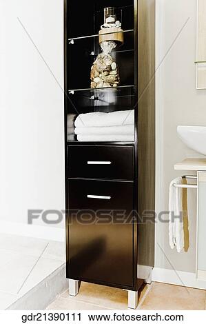 Stock Image - Cabinet in the bathroom. Fotosearch