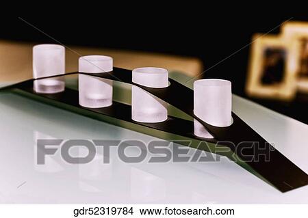 Candles on a table View Large Photo Image Picture - Candles on a table. Fotosearch