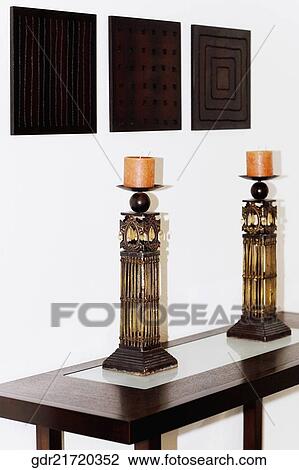 Stock Image - Candles on a table. Fotosearch