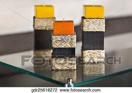 Candles on a table View Large Photo Image Stock Image - Candles on a table. Fotosearch