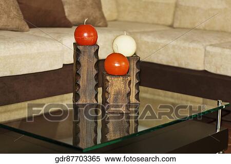 Candles on a table View Large Photo Image Stock Photography - Candles on a table. Fotosearch