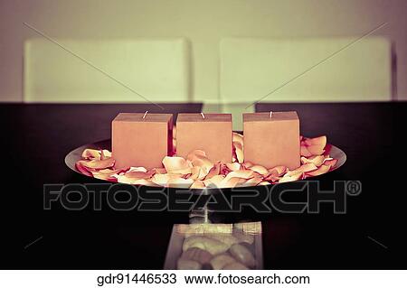 Candles with rose petals on a plate View Large Photo Image Stock Image - Candles with rose petals on a plate. Fotosearch