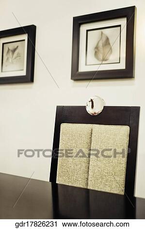 Chair and a table in a dining room View Large Photo Image Stock Image - Chair and a table in a dining room. Fotosearch