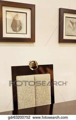 Chair and a table in a dining room View Large Photo Image Stock Image - Chair and a table in a dining room. Fotosearch