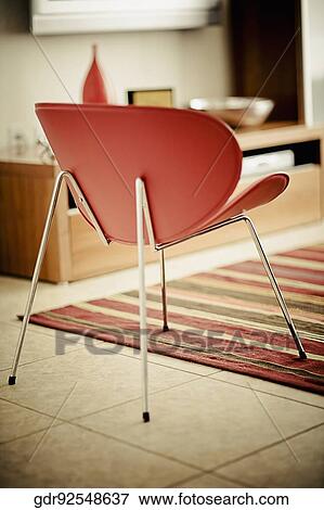 Chair in a living room View Large Photo Image Stock Photo - Chair in a living room. Fotosearch