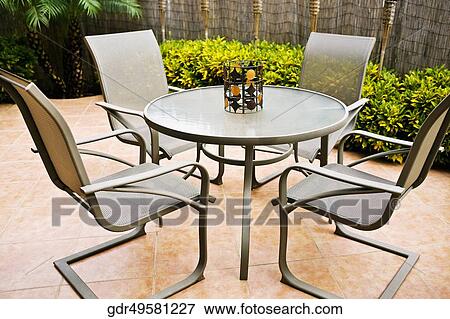 Chairs around a table View Large Photo Image Stock Photo - Chairs around a table. Fotosearch