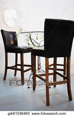 Chairs in a dining room View Large Photo Image Stock Image - Chairs in a dining room. Fotosearch