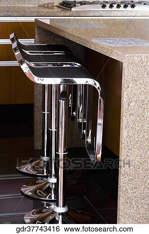 Chairs in the kitchen View Large Photo Image Stock Photograph - Chairs in the kitchen. Fotosearch