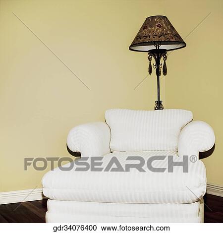 Stock Image - Chaise longue in a living room. Fotosearch