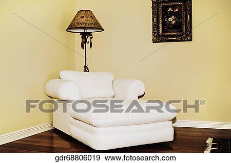 Chaise longue in a living room View Large Photo Image Stock Photo - Chaise longue in a living room. Fotosearch