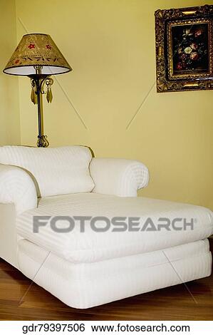 Chaise longue in a living room View Large Photo Image Stock Photograph - Chaise longue in a living room. Fotosearch