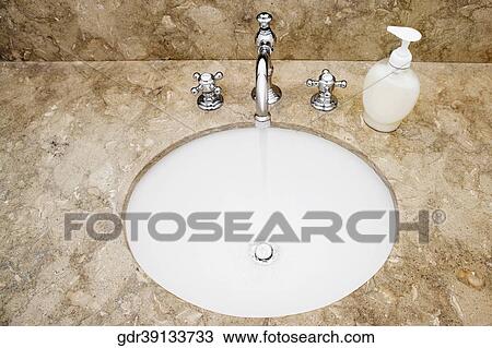 Close-up of a bathroom sink View Large Photo Image Stock Image - Close-up of a bathroom sink. Fotosearch