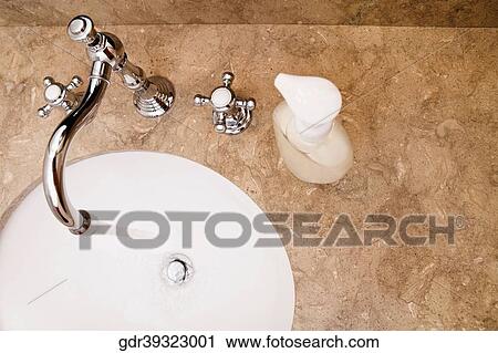 Close-up of a bathroom sink View Large Photo Image Stock Image - Close-up of a bathroom sink. Fotosearch