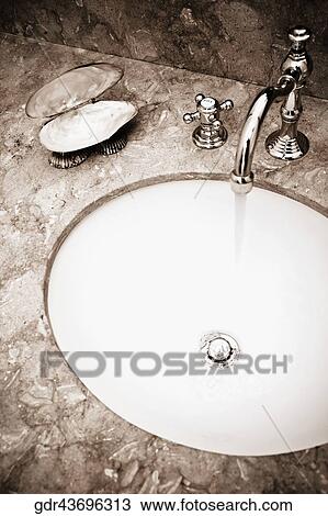 Close-up of a bathroom sink View Large Photo Image Stock Image - Close-up of a bathroom sink. Fotosearch