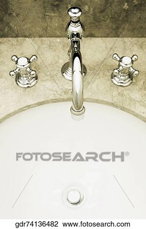 Close-up of a bathroom sink View Large Photo Image Stock Image - Close-up of a bathroom sink. Fotosearch