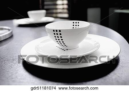 Close-up of a bowl and a plate on a tray View Large Photo Image Picture - Close-up of a bowl and a plate on a tray. Fotosearch