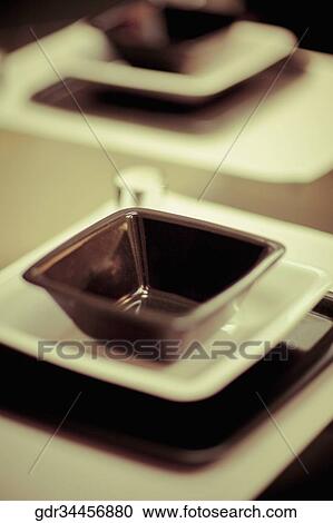 Close-up of a bowl and a plate on a tray View Large Photo Image Stock Image - Close-up of a bowl and a plate on a tray. Fotosearch