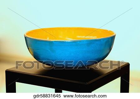 Close-up of a bowl on a stool View Large Photo Image Stock Photography - Close-up of a bowl on a stool. Fotosearch