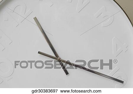 Stock Photo - Close-up of a clock. Fotosearch