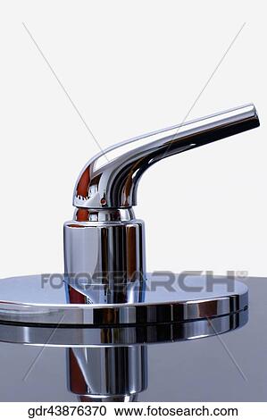 Close-up of a faucet View Large Photo Image Stock Image - Close-up of a faucet. Fotosearch