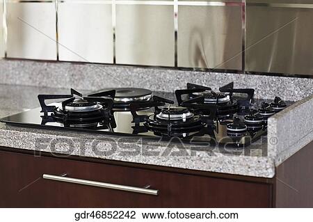 Close-up of a gas stove burner View Large Photo Image Stock Image - Close-up of a gas stove burner. Fotosearch