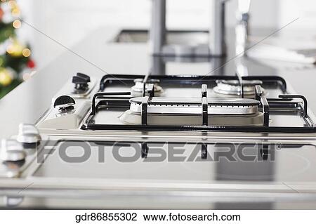 Close-up of a gas stove burner View Large Photo Image Stock Image - Close-up of a gas stove burner. Fotosearch