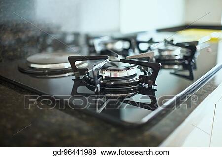 Close-up of a gas stove burner View Large Photo Image Stock Photo - Close-up of a gas stove burner. Fotosearch