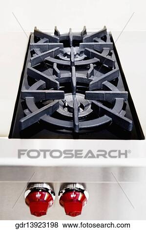 Close-up of a gas stove View Large Photo Image Stock Photo - Close-up of a gas stove. Fotosearch