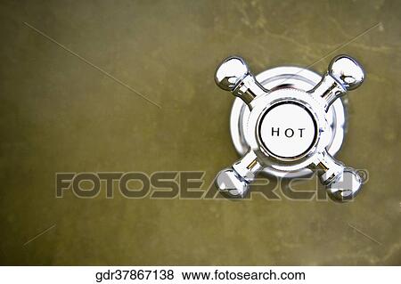 Close-up of a hot water shower knob View Large Photo Image Stock Photo - Close-up of a hot water shower knob. Fotosearch