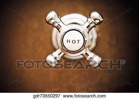 Close-up of a hot water shower knob View Large Photo Image Stock Photo - Close-up of a hot water shower knob. Fotosearch
