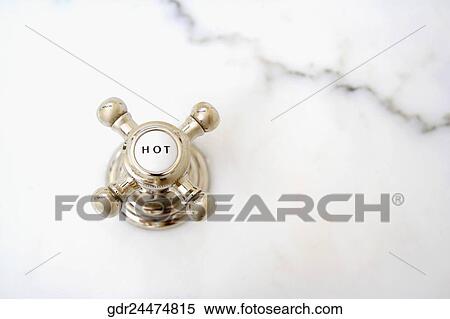 Close-up of a hot water shower knob View Large Photo Image Stock Photography - Close-up of a hot water shower knob. Fotosearch