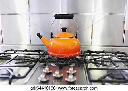 Stock Photograph - Close-up of a kettle on a stove. Fotosearch