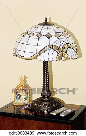 Stock Photo - Close-up of a lamp on a table. Fotosearch