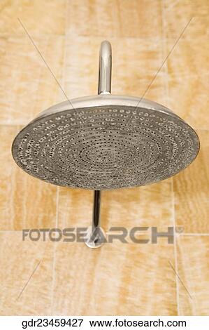 Close-up of a shower head in the bathroom View Large Photo Image Stock Photo - Close-up of a shower head in the bathroom. Fotosearch